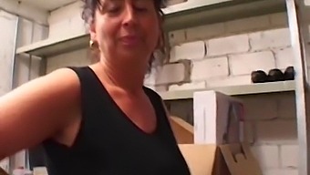Ample-Breasted Mature Woman Engages In Sexual Activity In A Storage Area