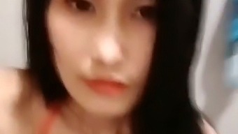 Thai Adult Film Actress Wears Stilettos And Purple Sex Toy